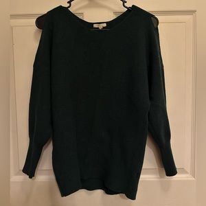 Green sweater with cut shoulders
